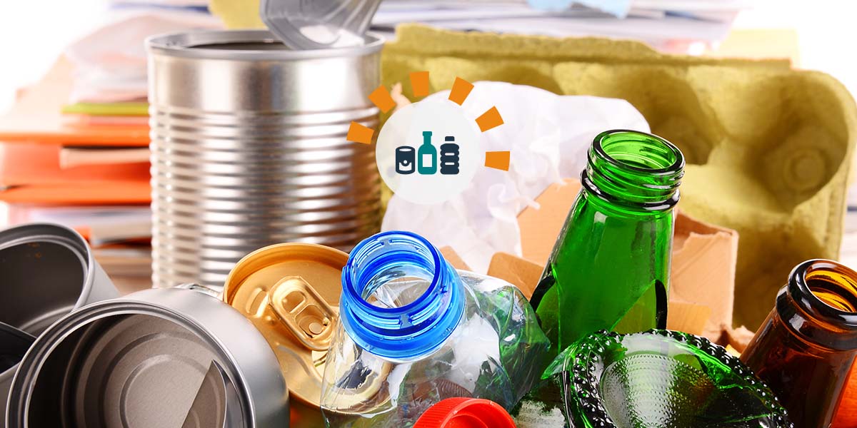 Glass, plastic and metal in a pile for recycling.
