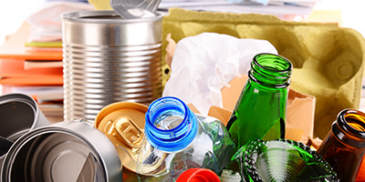 Glass, plastic and metal in a pile for recycling.