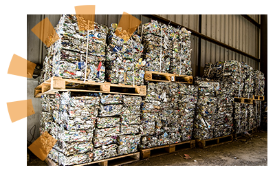 Stacks of recycling materials on pallets.