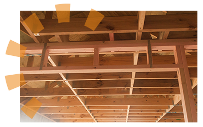 The interior studs of an old barn ceiling needing to be torn down. 