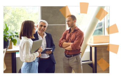 Group of business people talking to each other after a meeting.
