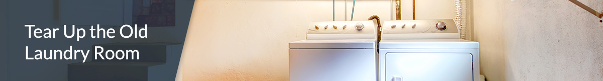 Bare laundry room with old washer and dryer.