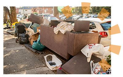 A pile of trash on the curb.