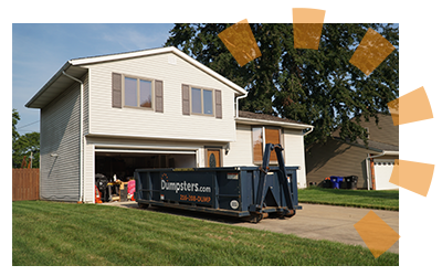 A Dumpsters.com roll off dumpster outside of a house.