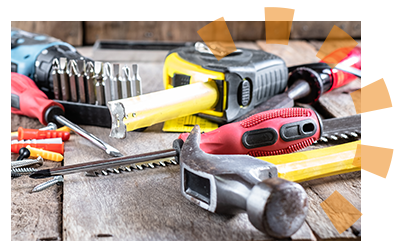 A pile of different types of tools used in a home demolition