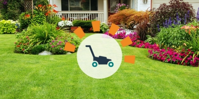 A well-manicured lawn with flowers, bushes and small shrubbery for landscaping accents.