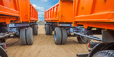 Trailers lined up in dirt