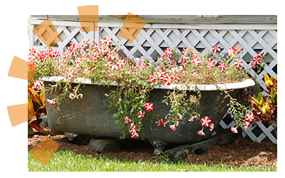 A bathtub upcycled into a planter.