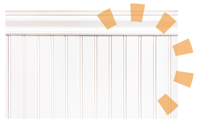 White wainscoting trim glued at the top of the panel.
