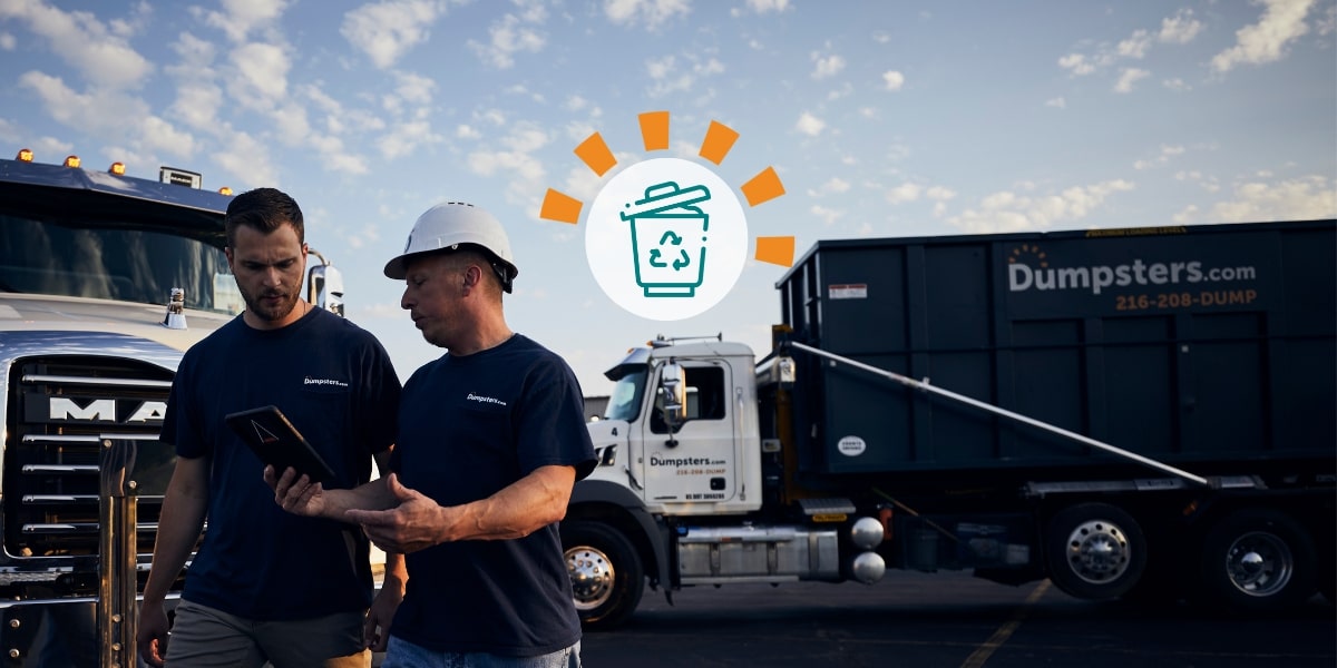 Dumpsters.com Employees in Front of Dumpsters.com Truck