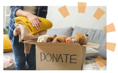 Woman Putting Clothes in Donation Box