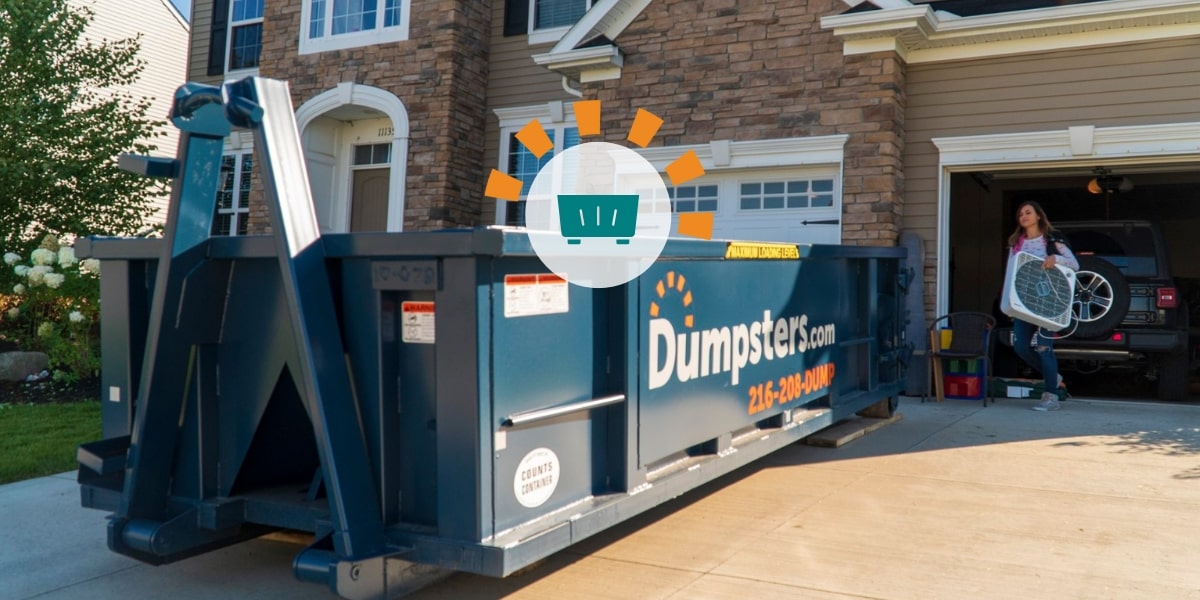 Dumpsters.com dumpster in front of brick home