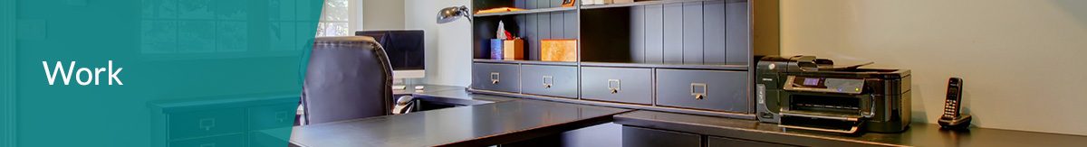 Upgraded home office interior with dark wood desk and built-in shelving for a professional who works remotely.