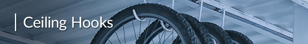Several Bicycles Hanging from Storage Hooks Mounted to Garage Ceiling.