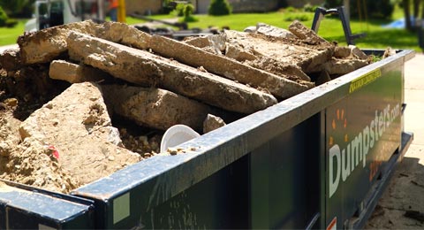 Dumpsters.com Roll Off Dumpster Filled With Concrete.