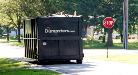 Roll Off Dumpster in Street.