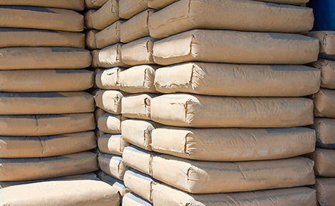 Stacks of bagged concrete mix.