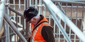 A Construction Worker Inspecting a Structure.