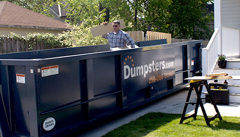 Roll Off Dumpster in Residential Driveway With Contractor.