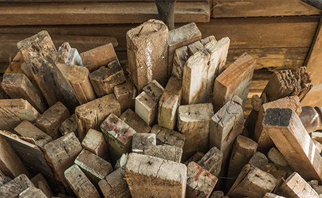 A pile of treated and untreated lumber ready to be donated.