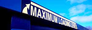 maximum loading level label on a dumpster