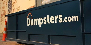 A Blue Dumpsters.com Roll Off Dumpster.
