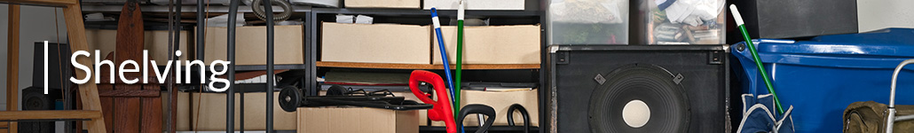Cluttered Objects in a Garage Against Wall Beneath Shelf.