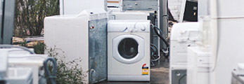 Old Washing Machine, Dryer and Fridge.