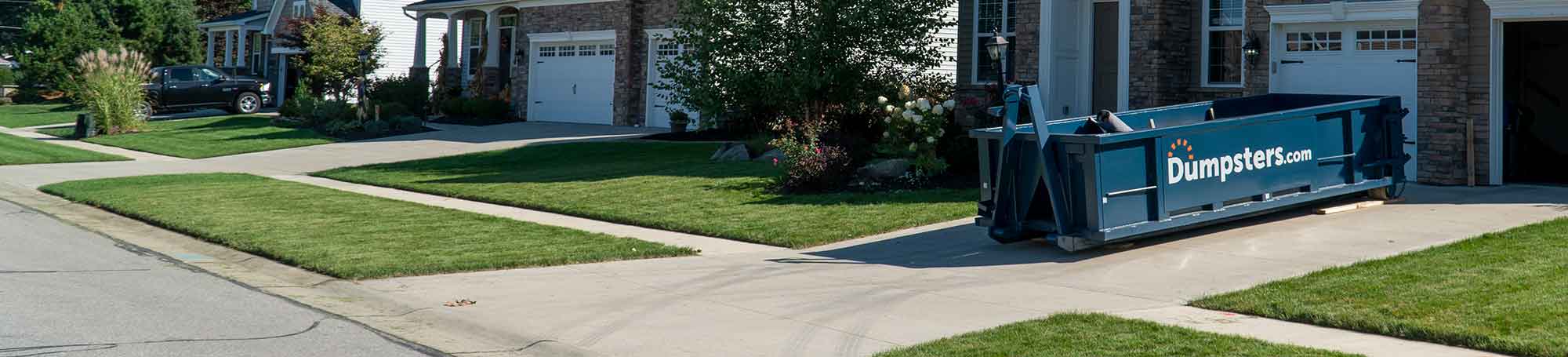 Roll Off Dumpster in a Residential Driveway