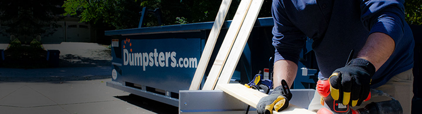 12 yard container in a driveway