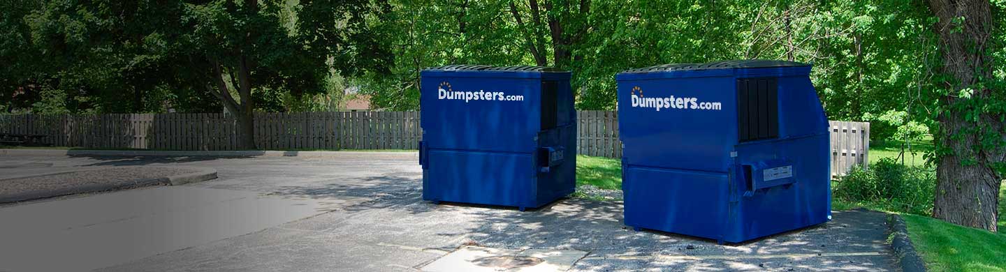 8 cubic yard dumpster in a commercial parking lot