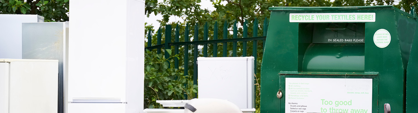 Kitchen appliances lined up outside.