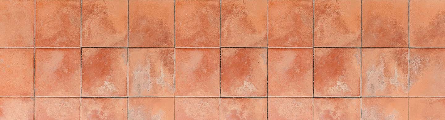 Burnt orange flooring tiles.