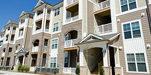 an apartment building with beige and tan walls