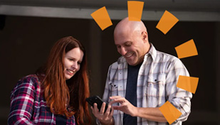 Two People Ordering a Dumpster on Phone