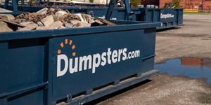 Cement in a Dumpsters.com roll off dumpster.