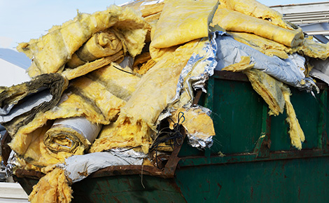 a dumpster full of old insulation.