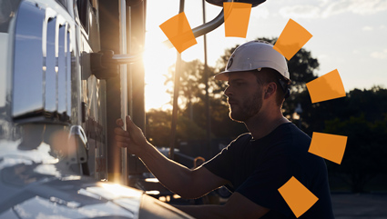 Man at jobsite wearing a construction hard hat.