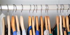 clothes hangers in an organized closet