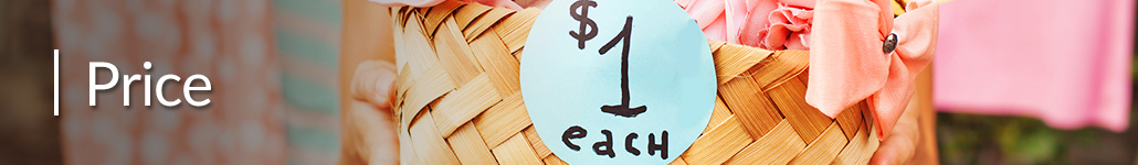 Basket of Yard Sale Items Labeled $1 Each.