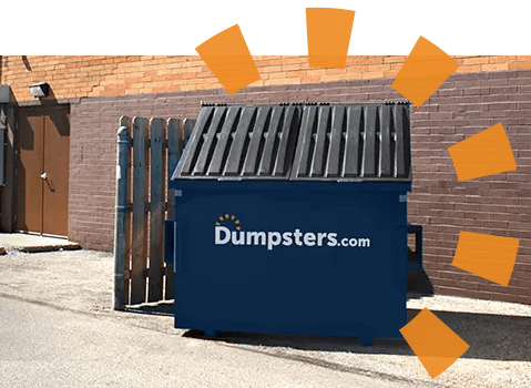 A Dumpsters.com front load dumpster behind a building.