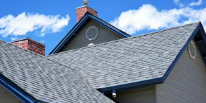 Overhead View of a Roof Against a Blue Sky.