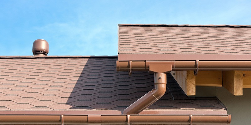 Copper gutters and a Red Roof.