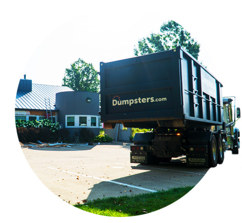 circle image of a roll off dumpster for a roofing project