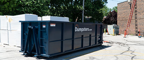 Dumpsters.com Roofing Dumpster on a Job Site