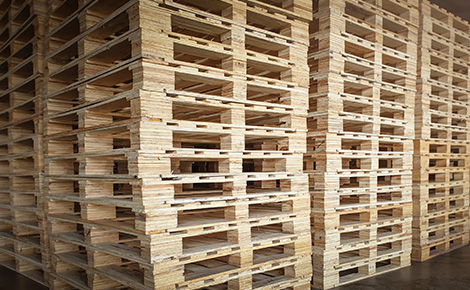 A stack of wood pallets ready to sell.