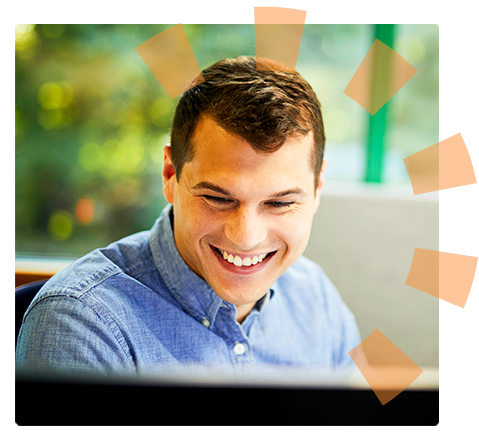 Dumpster Salesman Smiling at Computer.